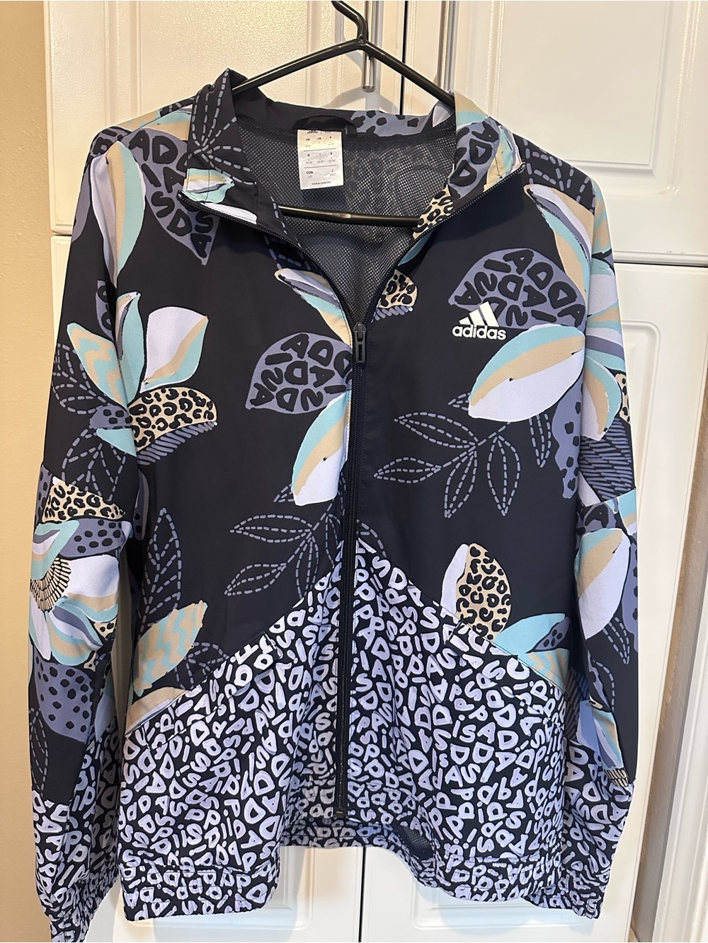 FARM Rio/Adidas callable Jacket with Pastel Blue, Cream & White Floral Print